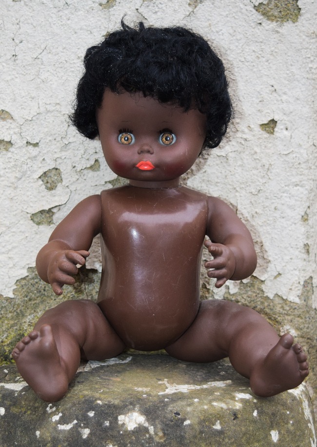 poupon CLodrey noir cheveux implantés